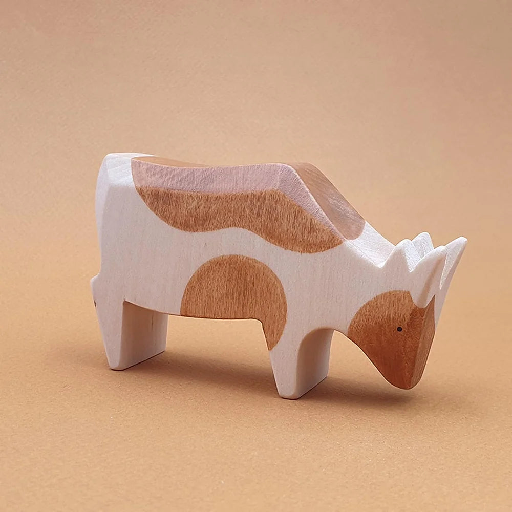 wooden brown spotted cow